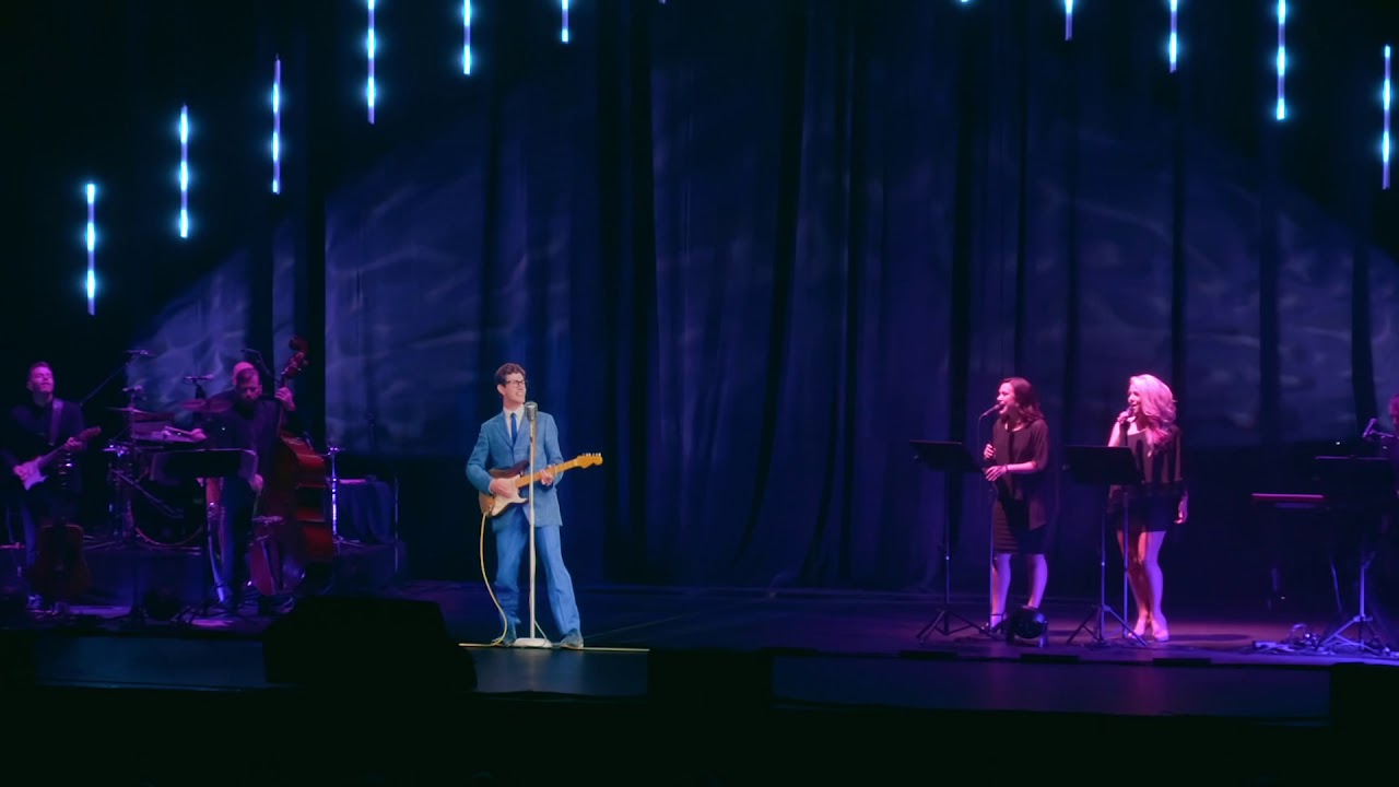 Hologram Buddy Holly performs with live musicians (thumbnail via BASE Hologram on YouTube.)